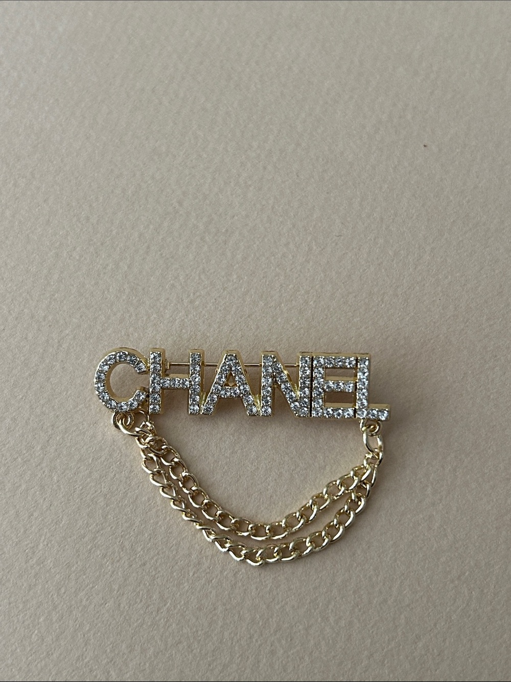 CHANEL Gold Logo Chain Brooch L8